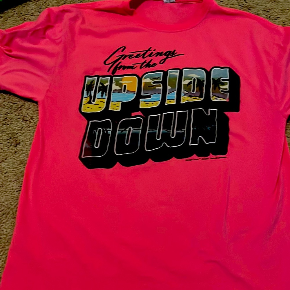 Bright pink stranger Things shirt